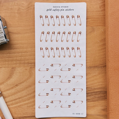 Sarica Studio - gold safety pin stickers